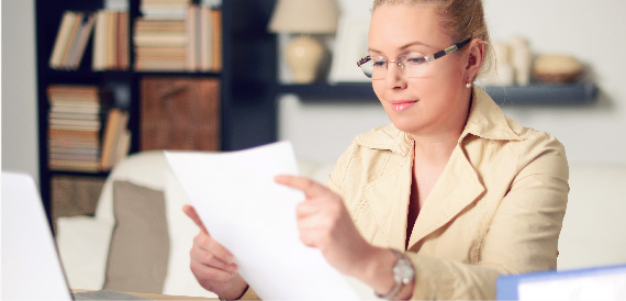 woman looking at documents