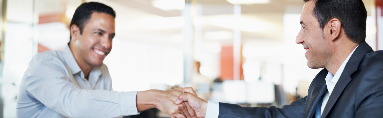 two men shaking hands